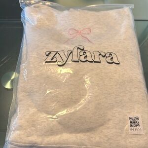 Grey bow hoodie with loveshackfancy style hood inside